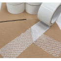 White anti-tamper adhesive tape that leaves writing if removed